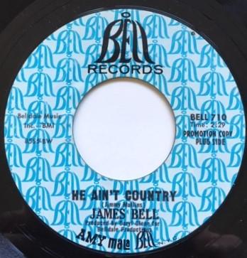 James Bell  - He Ain't Country / A Friendly Place To Cry
